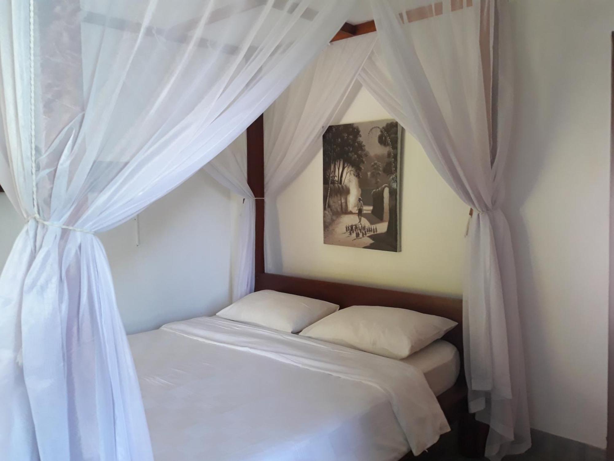 Le Jardin Hotel Amed Kamer foto
